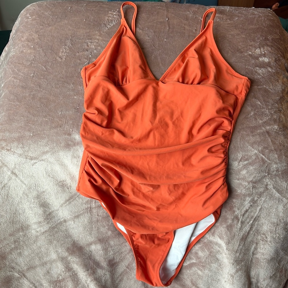 Dark orange one piece size medium - large